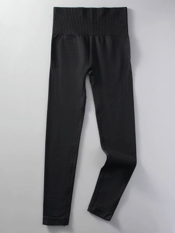 Women's seamless high waist yoga leggings SF0126 in black, made from nylon and spandex for comfort and mobility, full length.